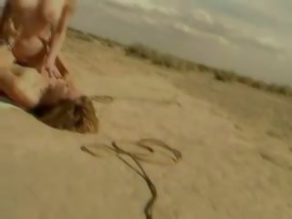 Busty blonde fucks outside on ground in vintage sex movie